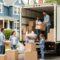 Family packing for a DIY move in a Boston neighborhood, illustrating the moving process